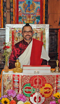 Hazlitt on the teaching throne at the Dzogchen Retreat Center USA.